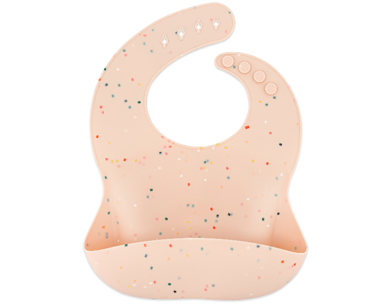 A silicone bib in a light pink color with adjustable neck straps and a pocket for food-catching.