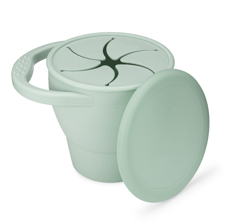 A gray silicone kids travel snack cup with a lid, designed with soft flaps for easy snack access and a handle for grip.